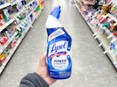 hand holding lysol toilet bowl cleaner in walgreens