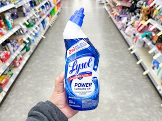 hand holding lysol toilet bowl cleaner in walgreens