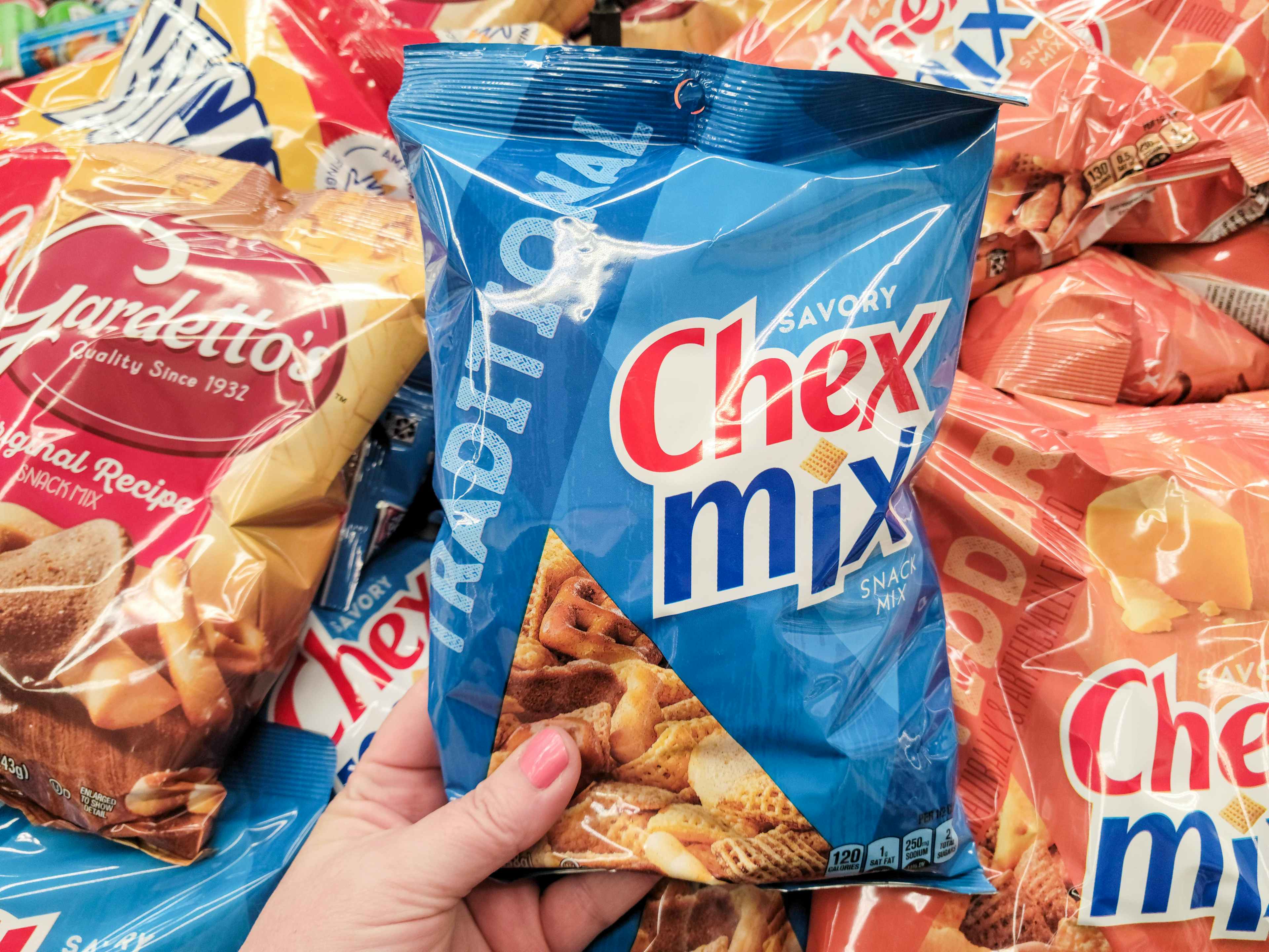 hand holding chex mix snack mix