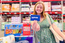 person holding sams club membership card