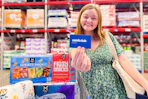 person holding sams club membership card