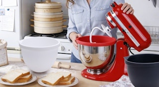silicone mixer bowls next to a mixer on a counter