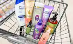 shopping cart with aussie, head & shoulders, mielle, and pantene products