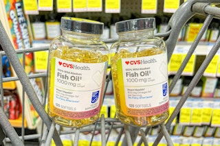 two containers of cvs health fish oil supplements in shopping cart