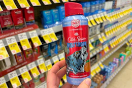 hand holding old spice body spray