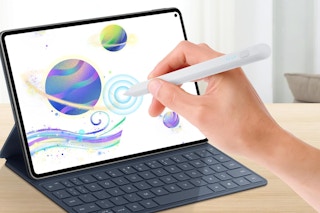 person using a stylus on a tablet computer