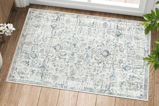 Lifestyle image of area rug by door inside home