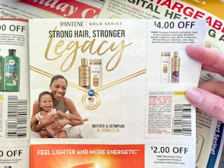 A newspaper coupon for four dollars off Pantene products