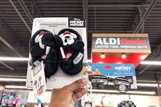 aldi disney deals slippers and sunglasses handheld near aldi sign