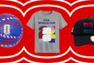 fifa world cup soccer ball, tshirt, and hat on a red background