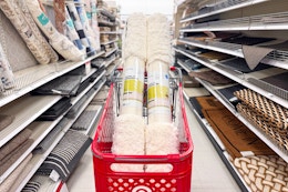 2 shag area rugs sitting in a target cart