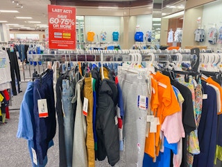 rack of clearance kids clothes at Macy's