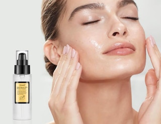 a woman using snail mucin serum on her face