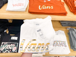 vans shirts on shelf