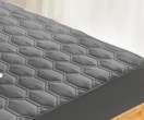 a grey mattress protector