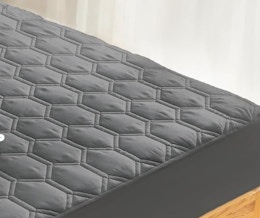 a grey mattress protector