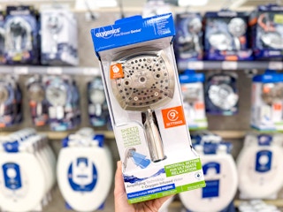 hand holding an oxygenics showerhead at target