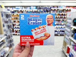 hand holding mr. clean magic erasers in walgreens