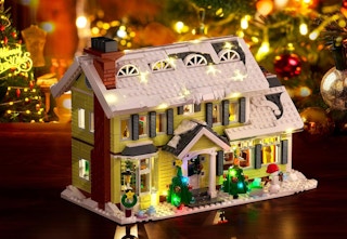 a Christmas house building set with lights