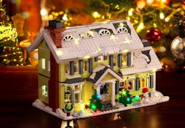 a Christmas house building set with lights