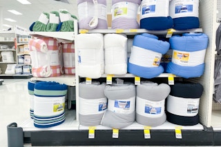 comforters on clearance sitting on a target shelf