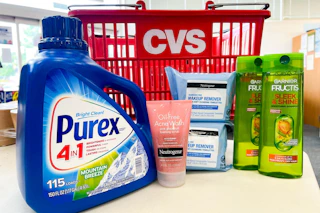 purex detergent, neutrogena wipes and face wash, and garnier shampoo in front of a cvs basket