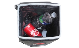 A view above an EPAuto trash can with a soda and water bottle in it.