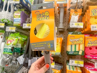 a person holding a dish daddy in their hand at target