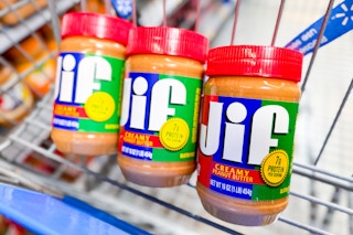 3 jars of jif peanut butter in a walmart cart