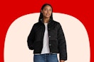 Stock image of a woman wearing a black Time and Tru puffer jacket