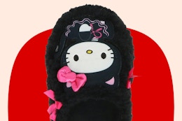 Hello Kitty Halloween Slipper (close up) over red/cream max shape background