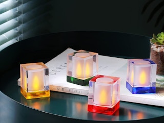 Square flameless candles on a table