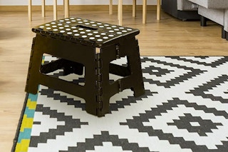 A children's step stool in a room