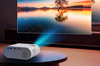 a mini projector on a table