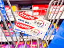 2 Colgate Total Toothpaste packages in Walmart shopping cart