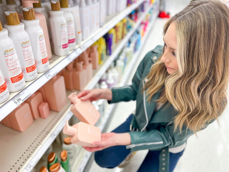 a person shopping for hair care products at Target