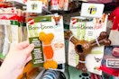 hand holding a package of bam bones dog chews