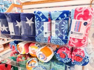 A shelf of The Big One beach towels at Kohls