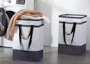 two laundry baskets in a laundry room with clothes inside