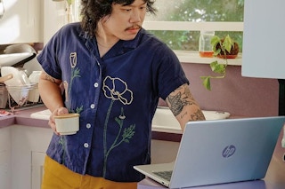 a man on a hp laptop