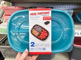 person holding a 2-pack of meal prep containers