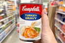 hand holding a can of campbells gravy