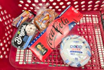 ball park buns and hot dogs, breyers ice cream, coca-cola, and dixie paper plates in a cart
