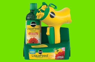 a plant food kit with a nozzle sprayer