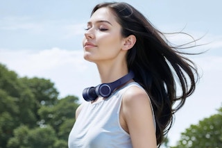 a woman wearing a Portable Neck Fan