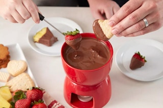 people using a mini fondue set