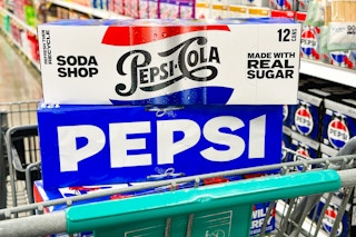 pepsi soda 12-packs stacked on shopping cart