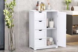 Lifestyle image of the Costway Storage Cabinet in bathroom setting