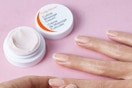 a person putting cuticle cream on their hands