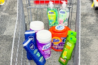 nivea body wash, lysol wipes, garnier shampoo, tide pods, and softsoap hand soap in a cart